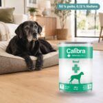 Perro junto a Calibra Dieta Veterinaria Renal para Perros en Lata Pack 6x400 g