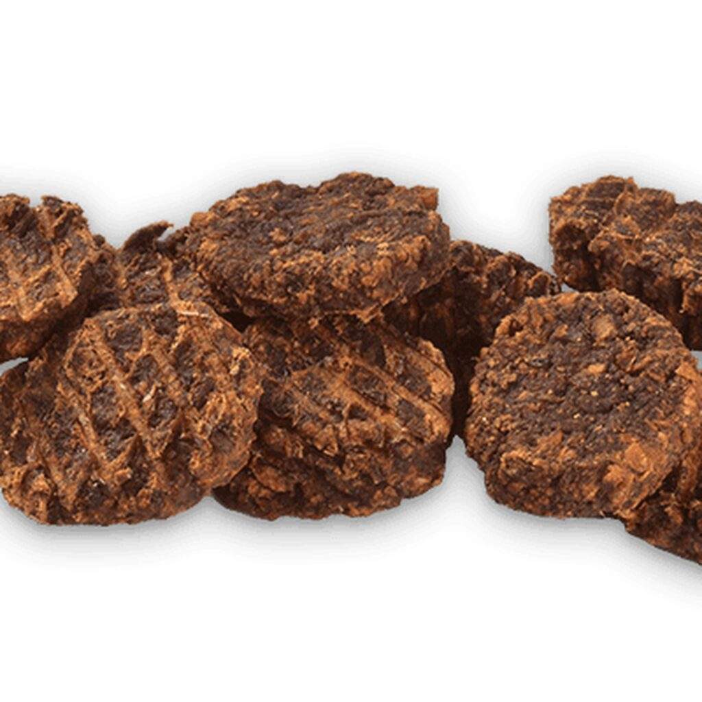 Ración diaria orientativa del snack Brit Jerky monedas de arenque según el peso del perro
