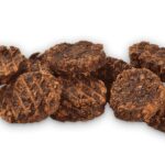 Ración diaria orientativa del snack Brit Jerky monedas de arenque según el peso del perro
