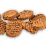 Ración diaria orientativa del snack Brit Jerky monedas de pavo según el peso del perro